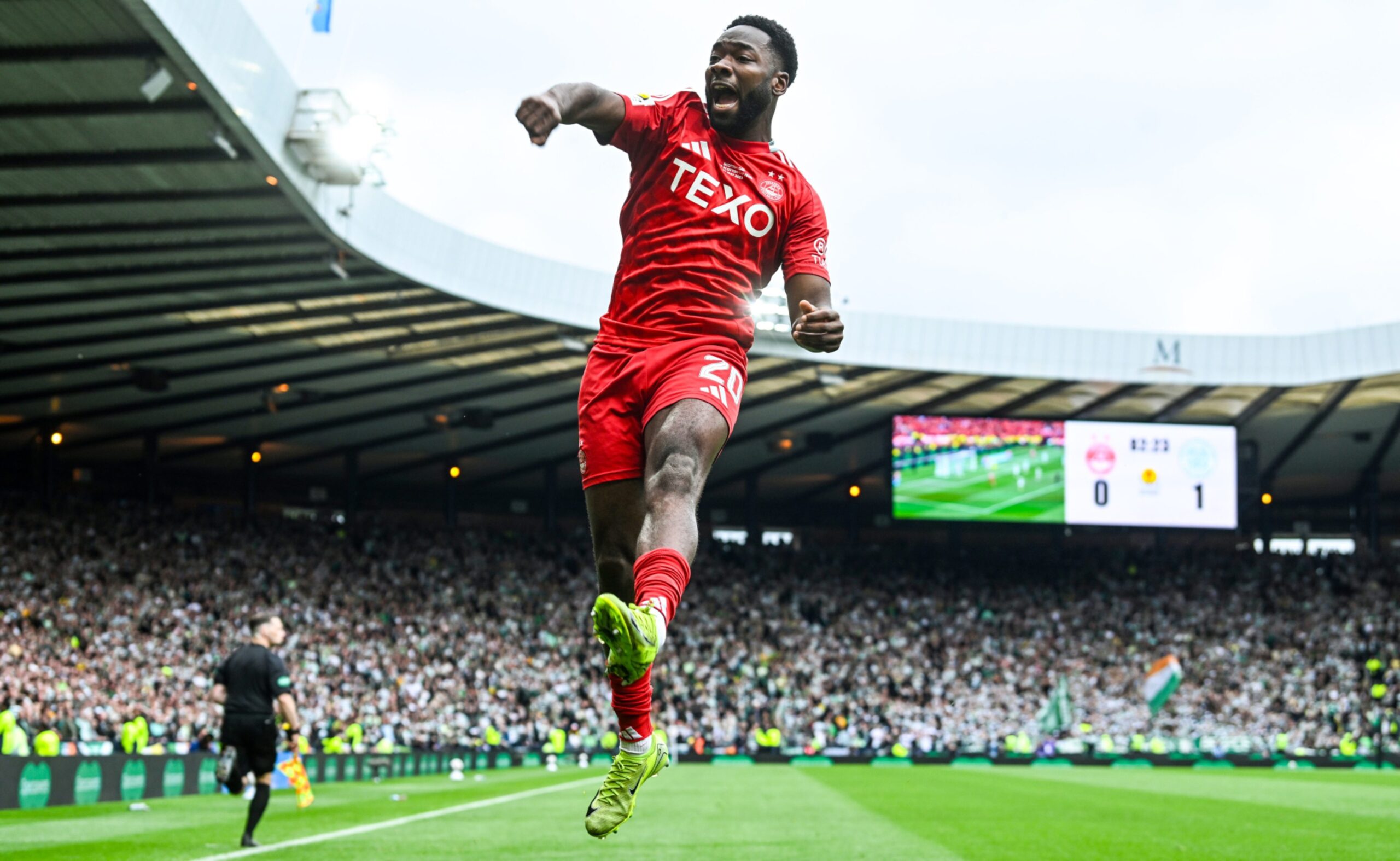 Aberdeen's Shayden Morris celebrates after his cross is turned into his own net by Celtic goalkeeper Kasper Schmeichel in the Scottish Cup final.