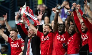 Aberdeen captain Graeme Shinnie lifts the Scottish Cup trophy during the Scottish Gas Men's Scottish Cup Final between Aberdeen and Celtic at Hampden Park, Image: Paul Devlin / SNS Group.