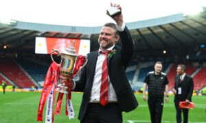 Aberdeen manager Jimmy Thelin with the Scottish Cup trophy at Hampden. Image: SNS