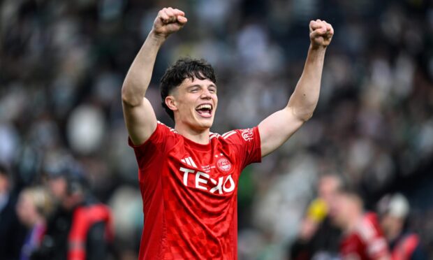 Aberdeen's Jack Milne celebrates after the penalty shootout win against Celtic in the Scottish Cup final. Image: SNS.