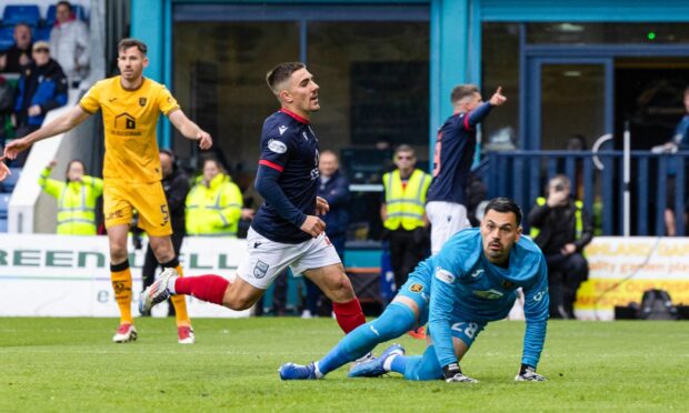 Josh Nisbet celebrates scoring against Livingston.