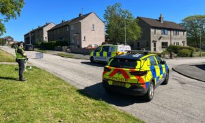 Police in the Mastrick area of Aberdeen. Image: DC Thomson