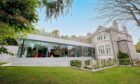 The mansion features a huge rear extension.