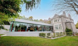 The mansion features a huge rear extension.