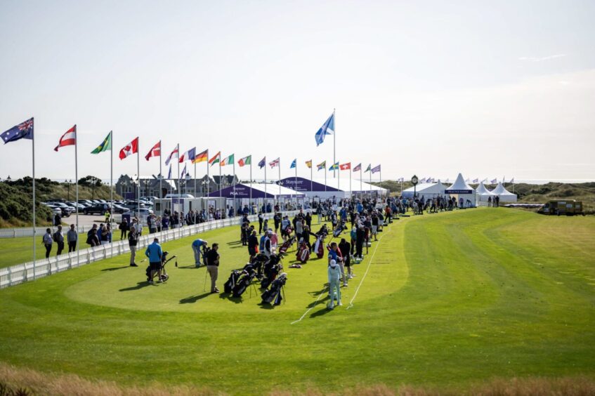 Players warm up at the practice ground in the seniors pga. 
