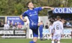 Blair Yule celebrates after scoring Cove Rangers' second goal in their play-off victory against Queen of the South. Photos by Dave Johnston.
