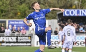 Blair Yule celebrates after scoring Cove Rangers' second goal in their play-off victory against Queen of the South. Photos by Dave Johnston.