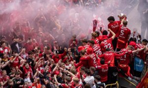 Aberdeen fans celebrate with their heroes on Broad Street. Image: Darrell Benns/DC Thomson.