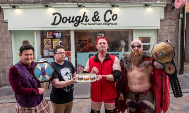 Dough & Co have teamed up with Wrestlezone. Pictured are from left, Brian Tucker, Rhys Dawkins, Scotty Swift and Caleb Valhalla.Image: Darrell Benns/DC Thomson