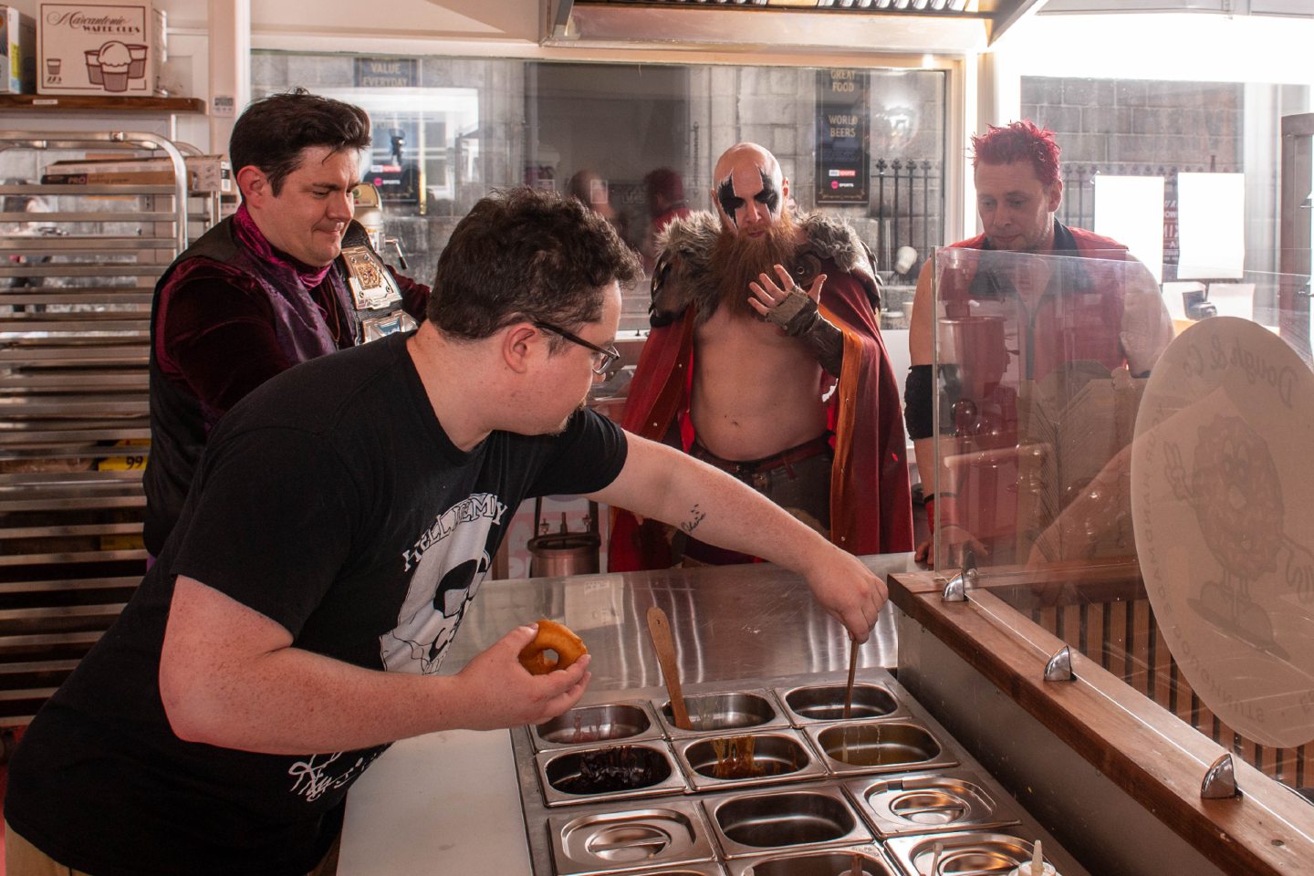 Pictured is Rhys Dawkins making a doughnut at Dough & Co.