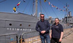Captain Hallvard Klungtveit and historian Ragnhild Bie outside the S/S Hestmanden