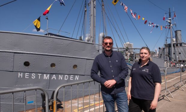 Captain Hallvard Klungtveit and historian Ragnhild Bie outside the S/S Hestmanden