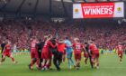 Aberdeen players celebrate after winning the Scottish Cup final against Celtic. Image Darrell Benns/DC Thomson