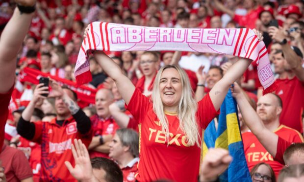 A day that will live long in the memory for the Aberdeen support. Image: Darrell Benns/DC Thomson