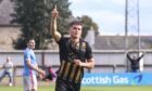 Angus Grant celebrates scoring for Huntly. Photo by Darrell Benns/DC Thomson.