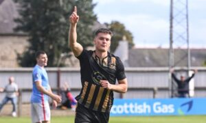 Angus Grant celebrates scoring for Huntly. Photo by Darrell Benns/DC Thomson.