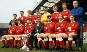 Aberdeen FC pose with the Scottish Cup in 1970. Back, from left, Teddy Scott (trainer), Tommy McMillan, Henning Boel, Jim Hermiston, Bobby Clark, Davie Robb, George Murray, Jimmy Bonthrone (assistant manager). Front, from left, Joe Harper, Derek McKay, Jim Forrest, Eddie Turnbull (manager), Martin Buchan (captain), George Buchan and Arthur Graham.