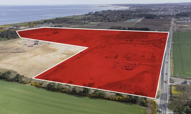 Drone image of Nairn with housing area at Delnies indicated.