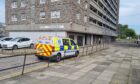 Police at Hutcheon Court. in Aberdeen. Image: DC Thomson