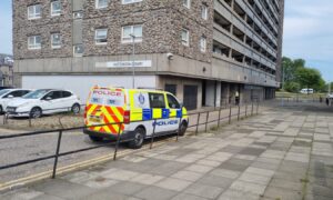 Police at Hutcheon Court. in Aberdeen. Image: DC Thomson