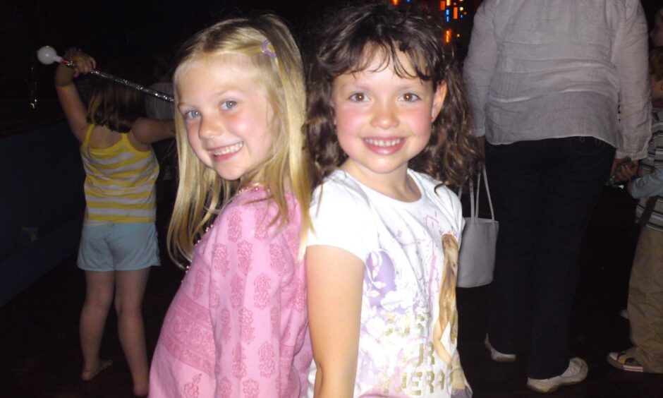 Emma Whitton and Abbie Main as young children. 