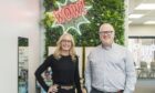 Lloyd Griffiths and business partner Fran Stephen inside opticians.
