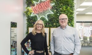 Lloyd Griffiths and business partner Fran Stephen inside opticians.
