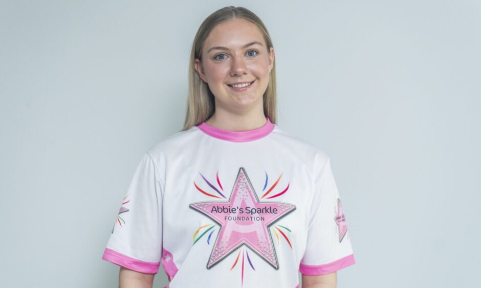 Emma Whitton now wearing Abbie's Sparkle Foundation t-shirt. 