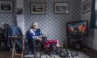 Carol Lawrie with her dog Skye at the home in Torry once her "pride and joy". Picture by Jason Hedges / DC Thomson.