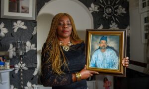 Seiyefa Van der Kist, with an image of her late husband Will. Picture by Kenny Elrick/DC Thomson