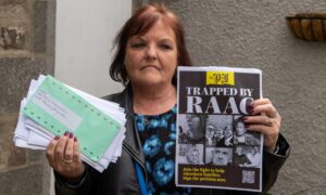 Torry Community Raac Campaigner Lynn Winstanley with letters  for the housing minister.
Picture by Kenny Elrick/DC Thomson