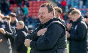 Caley Thistle boss Scott Kellacher celebrates the win with ICT fans at full-time. Image: Kath Flannery/DC Thomson