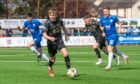 Midfielder Alfie Stewart on the ball for Inverness Caledonian Thistle against Montrose in SPFL League One at Links Park, Montrose, on May 3, 2025.