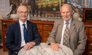 Charles, left, and John Michie in their Union Street pharmacy. The brothers have led the family business for more than 60 years. Image: Kath Flannery/DC Thomson