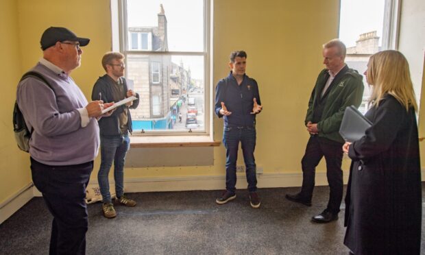 Designer Richard Tinto explains one of his ideas to the rest of the panel. Image: Kath Flannery/DC Thomson