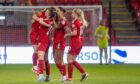 Aberdeen Women celebrate Darcie Miller's late equaliser against Montrose. Image: Kami Thomson/DC Thomson.