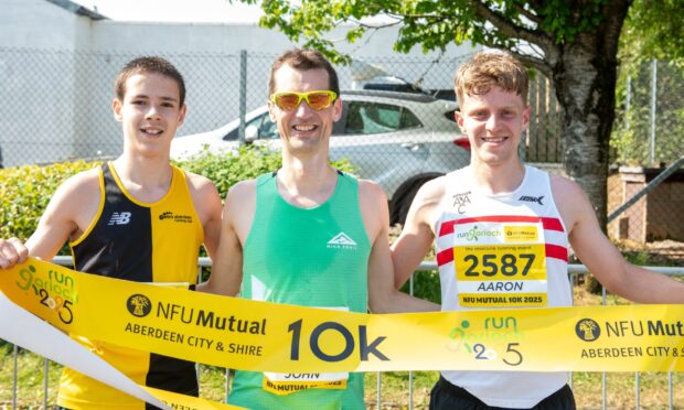 Run Garioch 2025 men's 10km winner John Lenehan, centre, with Fraser Mackenzie (left) and Aaron Odentz (right). Image: Kami Thomson/DC Thomson