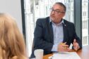 Aberdeen City Council co-leader Christian Allard speaks with Lindsay Bruce from The P&J about homeowners' Raac concerns. Image: Kami Thomson/ DC Thomson.