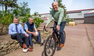 Pictured from left to right: Mike Macaulay, Pat Machray and Ian Ord, who have come up with the Kick the Ball campaign to raise money for UCAN's SURE unit. Photo by Kami Thomson/DC Thomson.