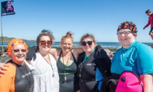 Locals take a stand against sea sewage in Stonehaven. Image: Kami Thomson/DC Thomson.