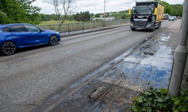 Raw sewage on road