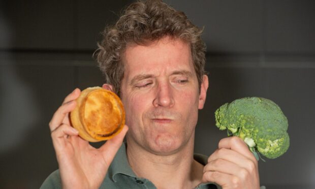 Pie or broccoli? Reporter Andy Morton gives vegetables a go as part of a Rowett Institute study. Image: Kami Thomson/DC Thomson