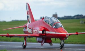 Red Arrows jet on the airfield at RAF Lossiemouth.
