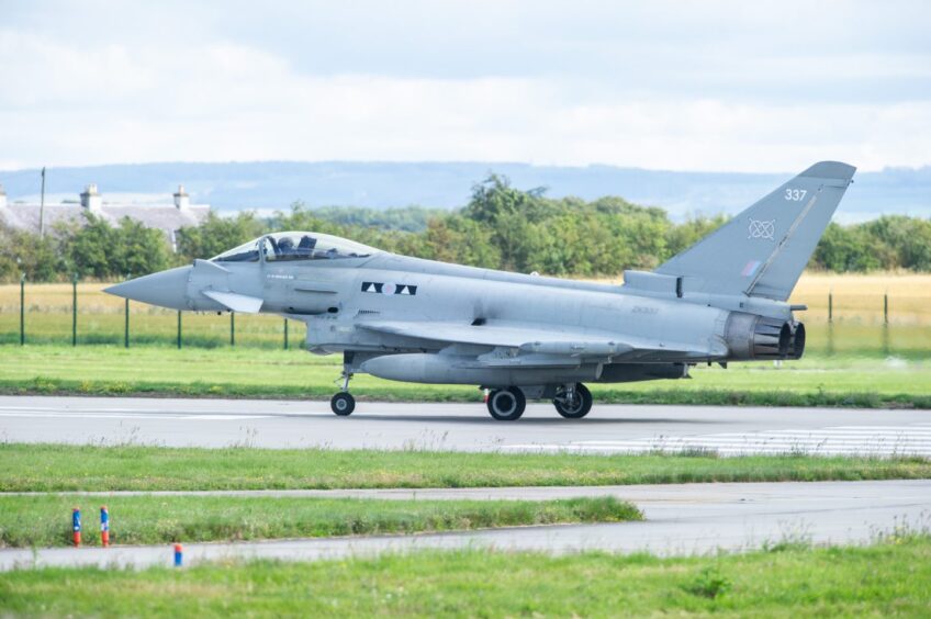 Typhoon up close on RAF airfield.