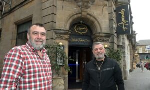 Mustafa Calisir and Fahri Gulmez, outside Aspendos in Inverness.