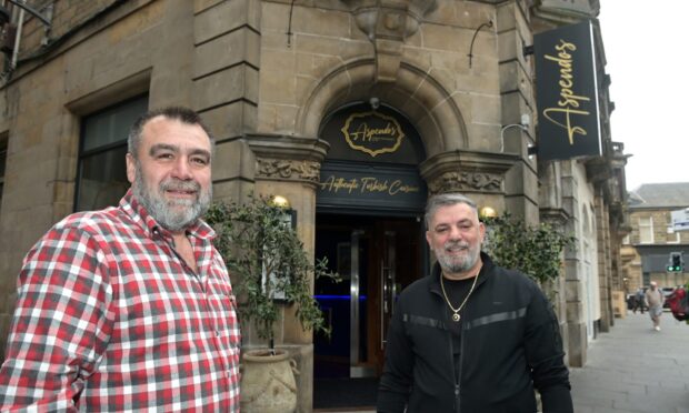 Mustafa Calisir and Fahri Gulmez, outside Aspendos in Inverness.
