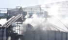 Crews extinguishing fire in Invergordon