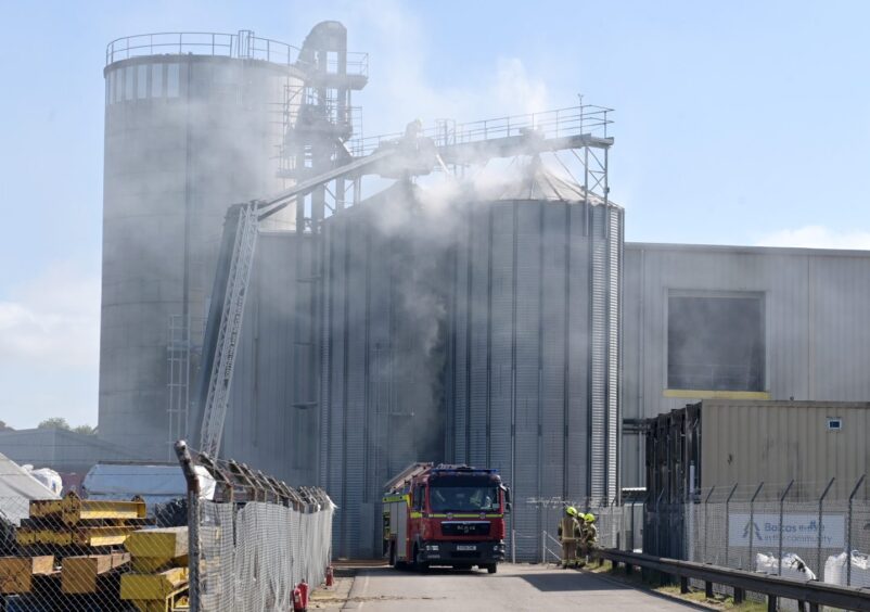 Crews are continuing to pour large amounts of water into the woodchip silos at the Balcas Energy site