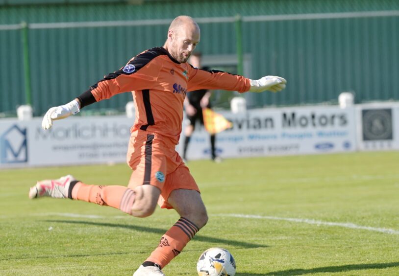 Buckie Thistle goalkeeper Mark Ridgers makes a clearance when playing against Brechin City at Victoria Park, Buckie, on August 31, 2024. 
