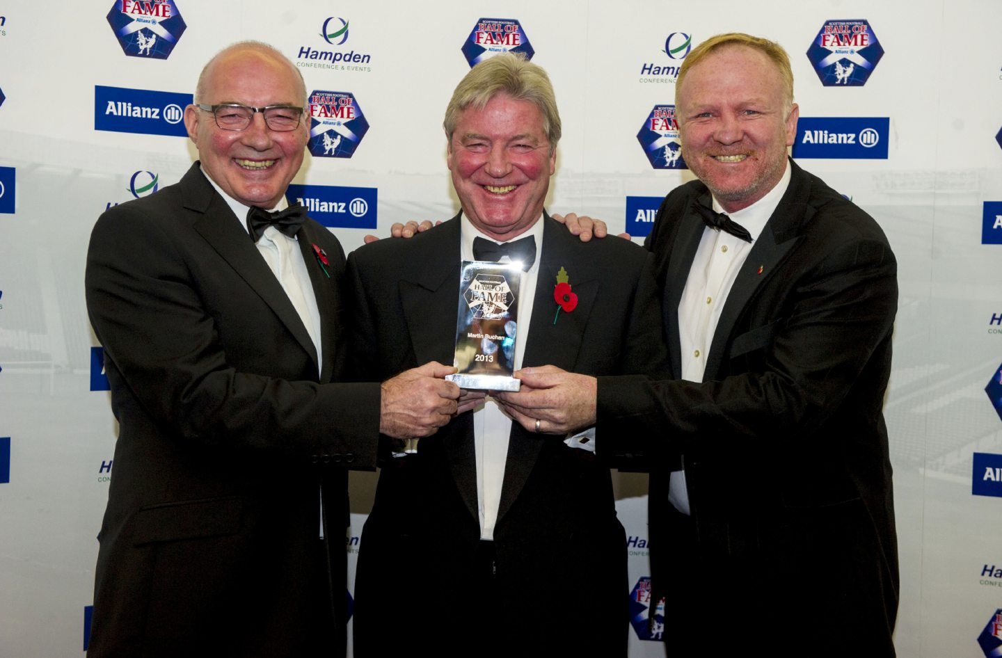 Aberdeen and Scotland legend Martin Buchan (centre) joins Gothenburg Greats Willie Miller (left) and Alex McLeish after receiving a Scottish Football Hall of Fame award in 2013. 